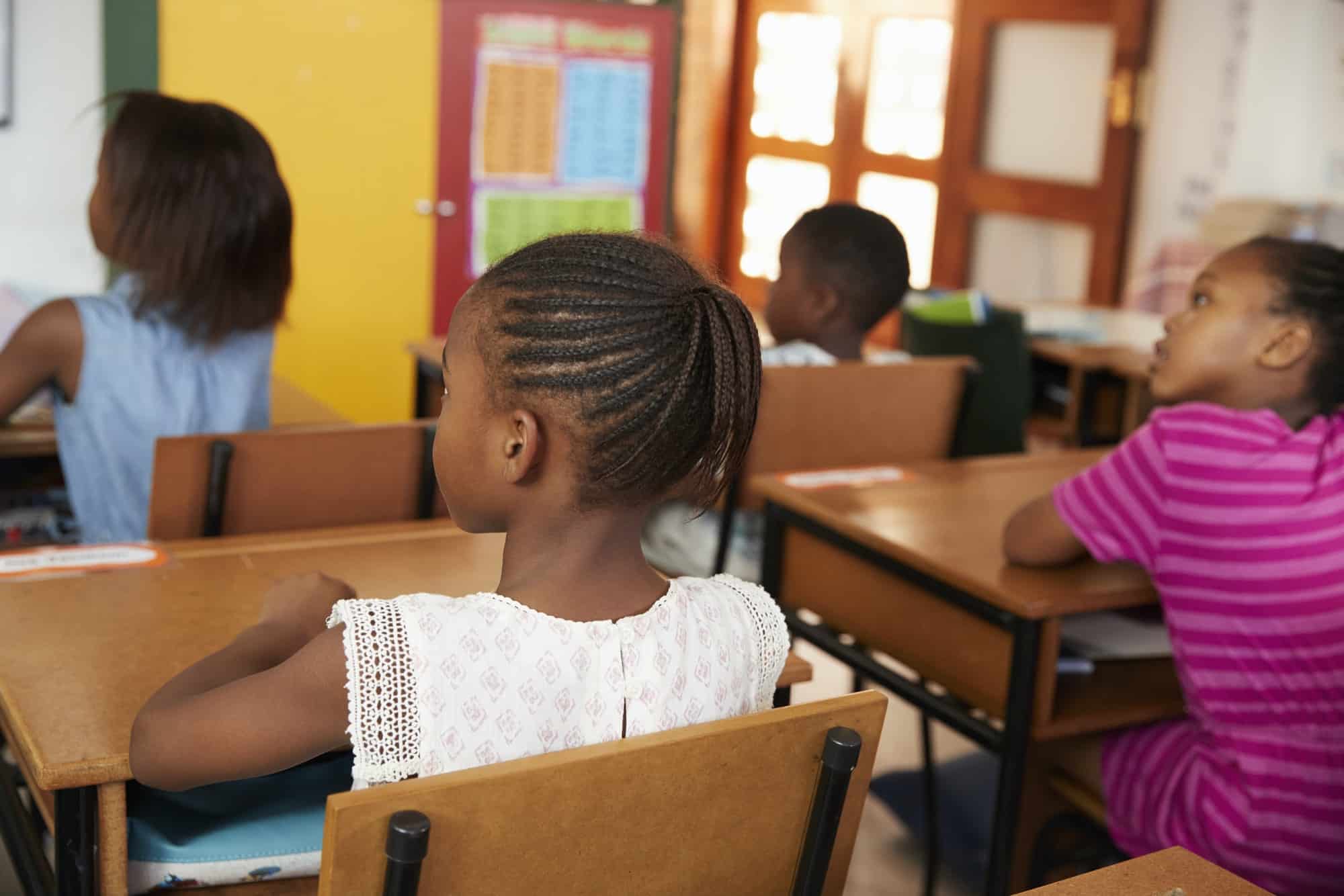 back-view-of-african-kids-in-an-elementary-school-class.jpg